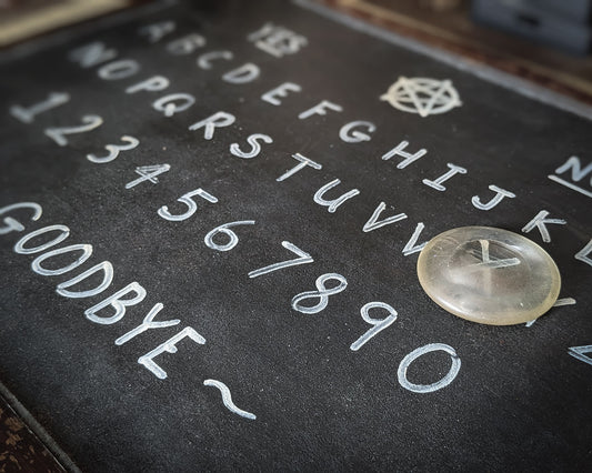 The Table Tippers Ouija Board